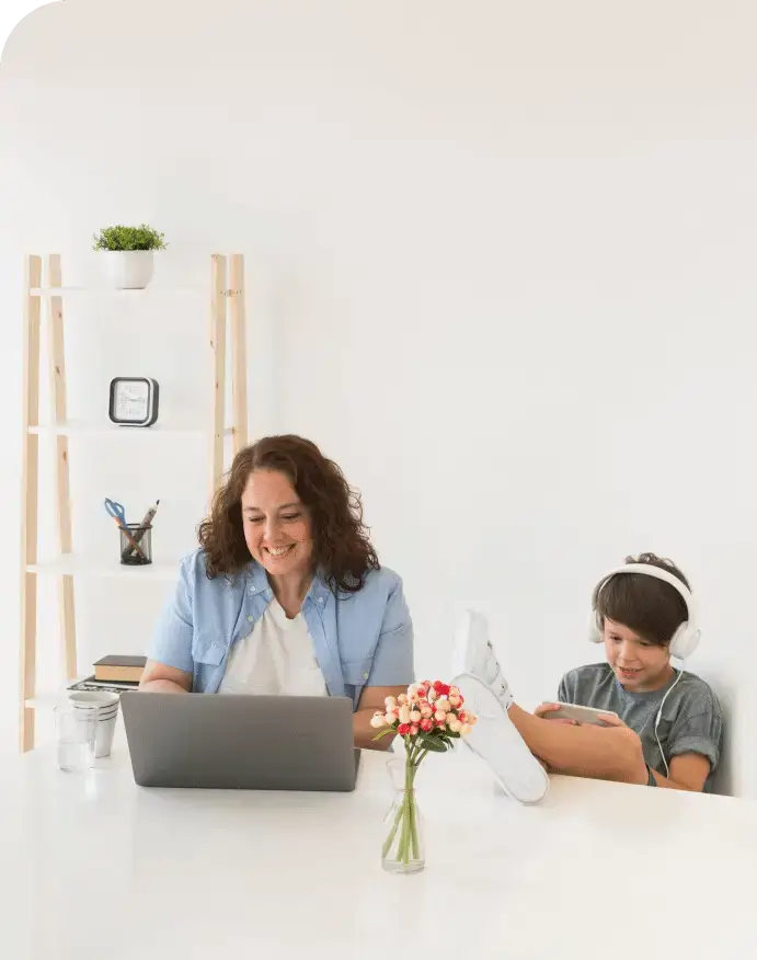 mother-with-child-working-laptop-1 (1)